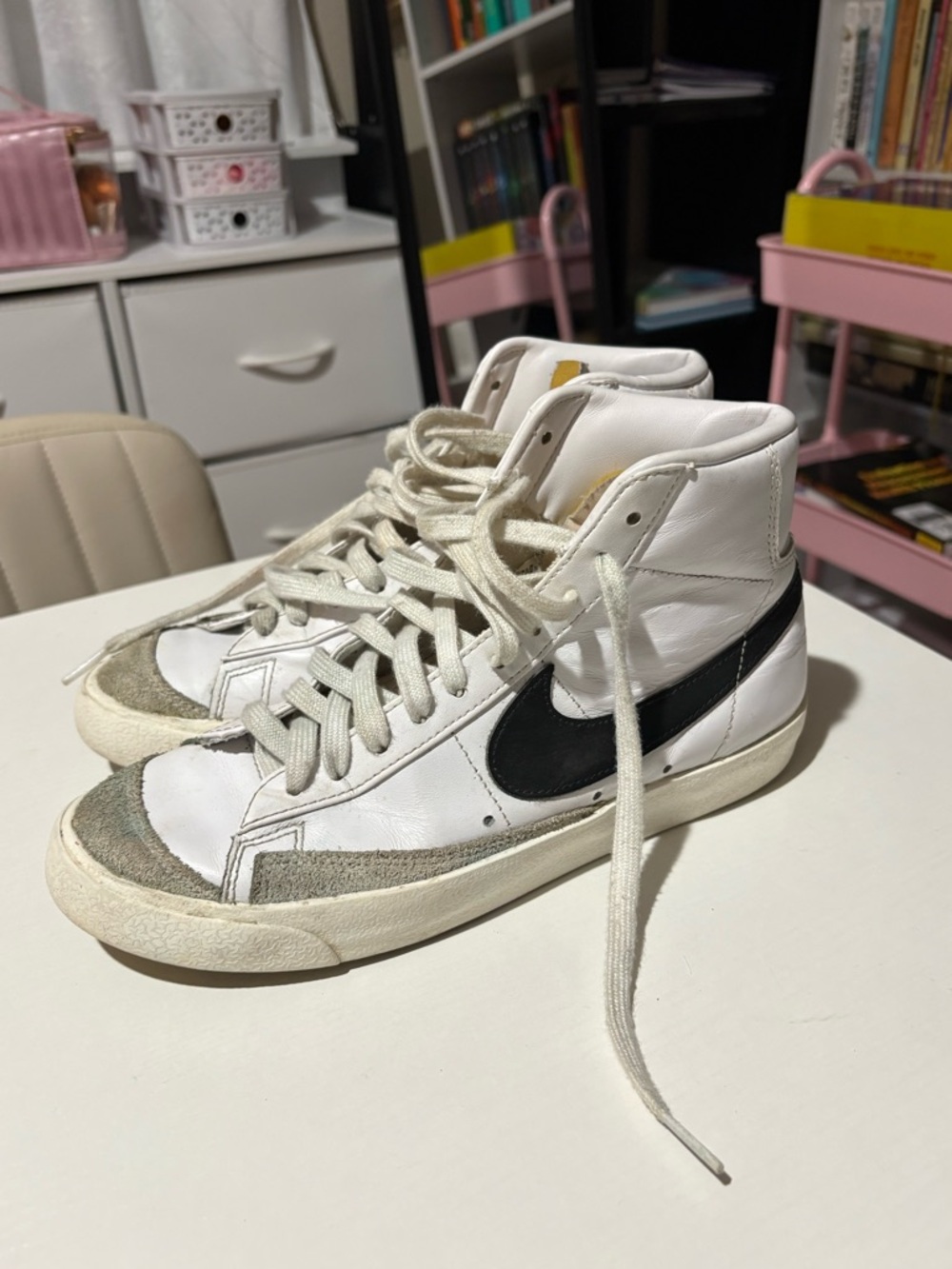 Nike White High-Top Sneakers with Black Swoosh